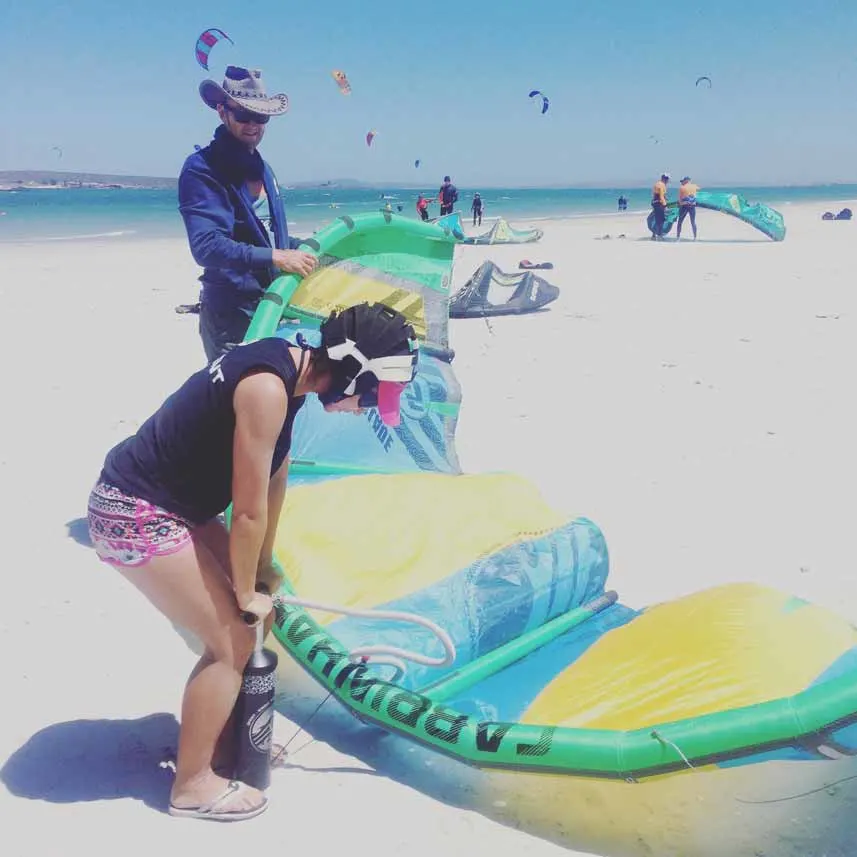 Alya pumping the kite, kiteboarding Langebaan.