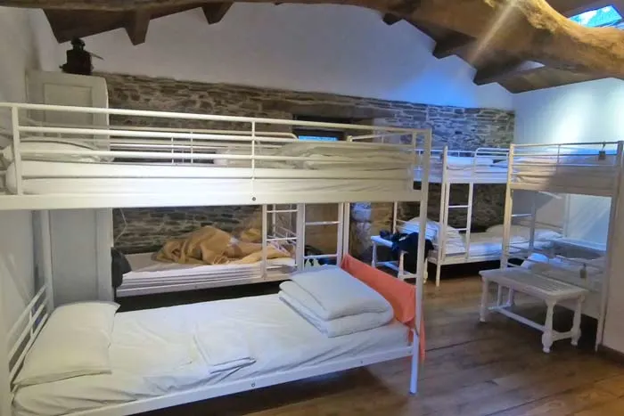 A dormitory in a private albergue with 4 bunk beds
