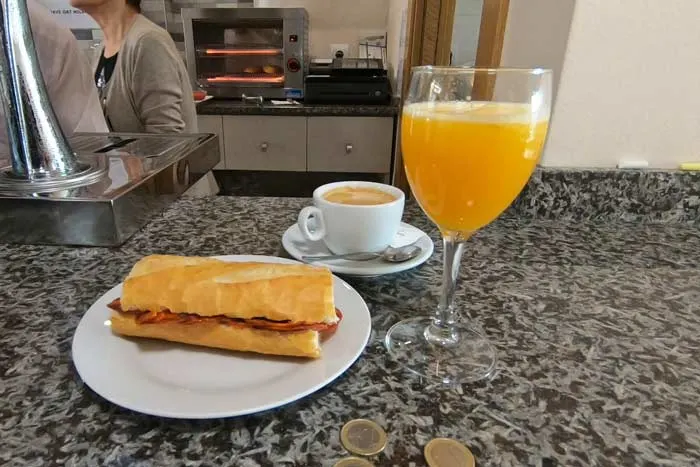 A 3-Euro breakfast on the Camino with a sandwich, coffee and orange juice