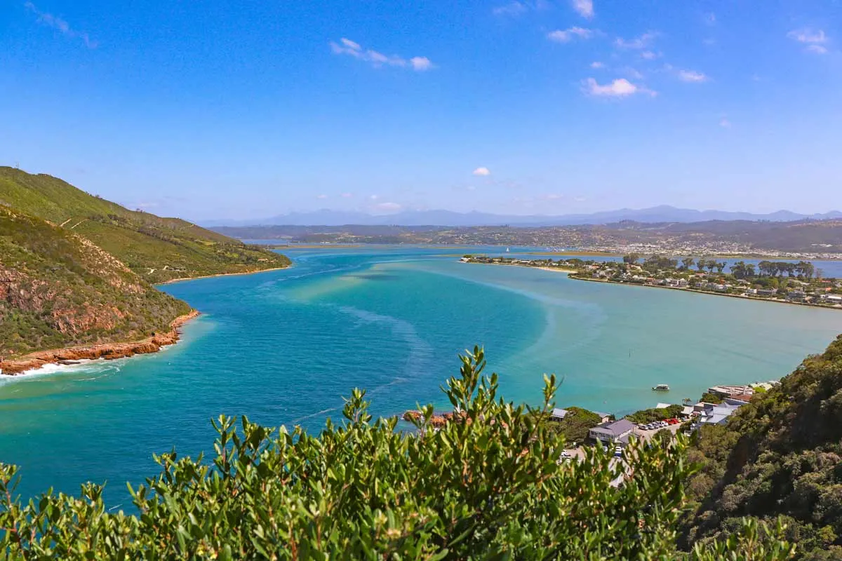 A view of a blue lagoon and beaches in Knysna from the top of the hills