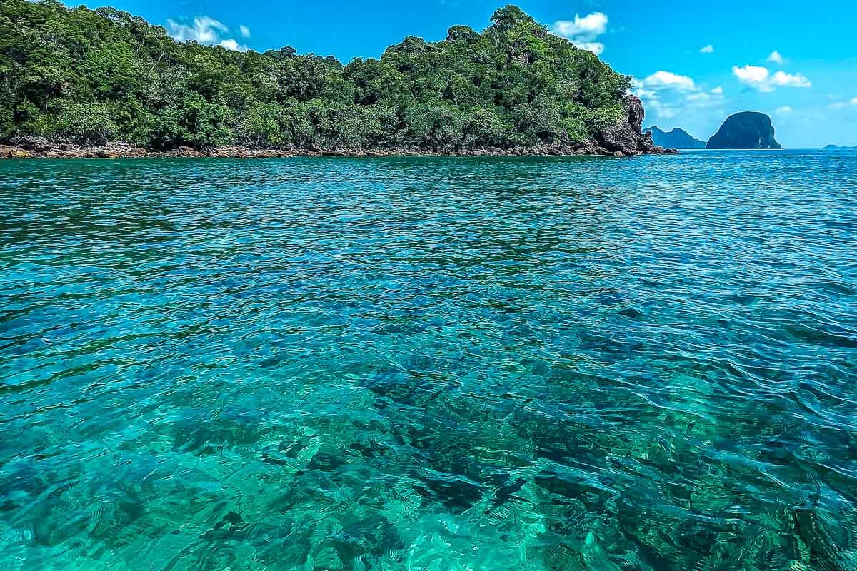 crystal clear flat ocean surrounding island