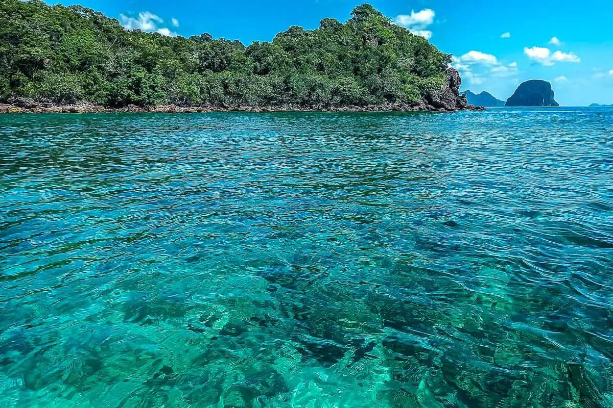 crystal clear flat ocean surrounding island