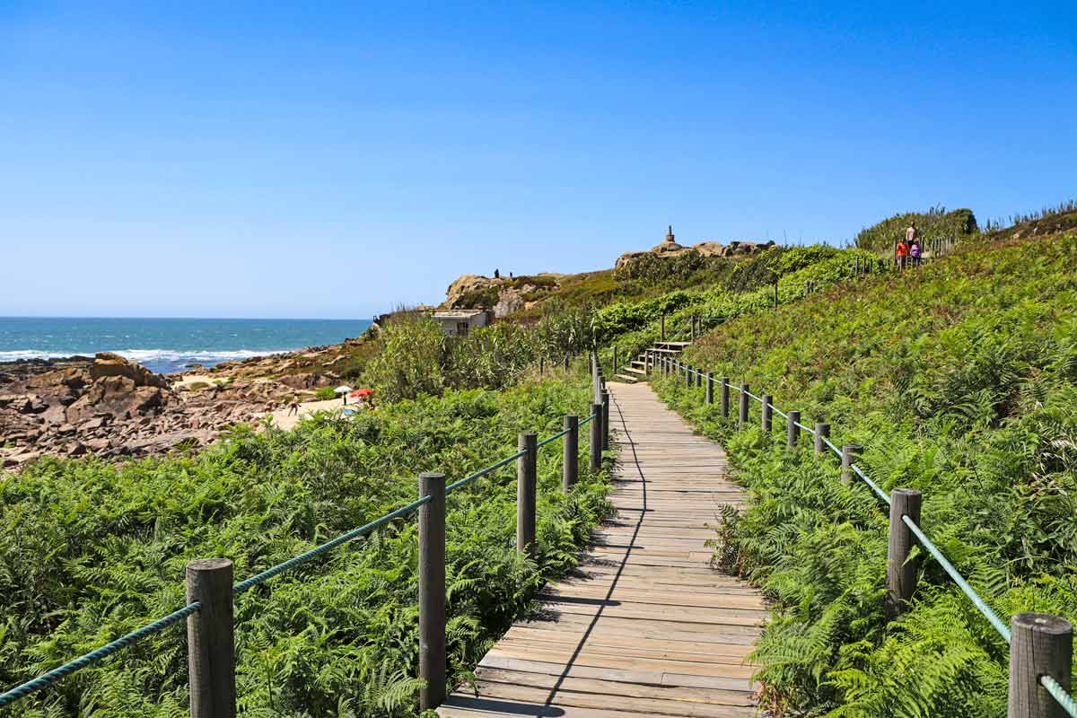 A picturesque boardwalk by the sea on the Camino route from Porto to Vila do Conde