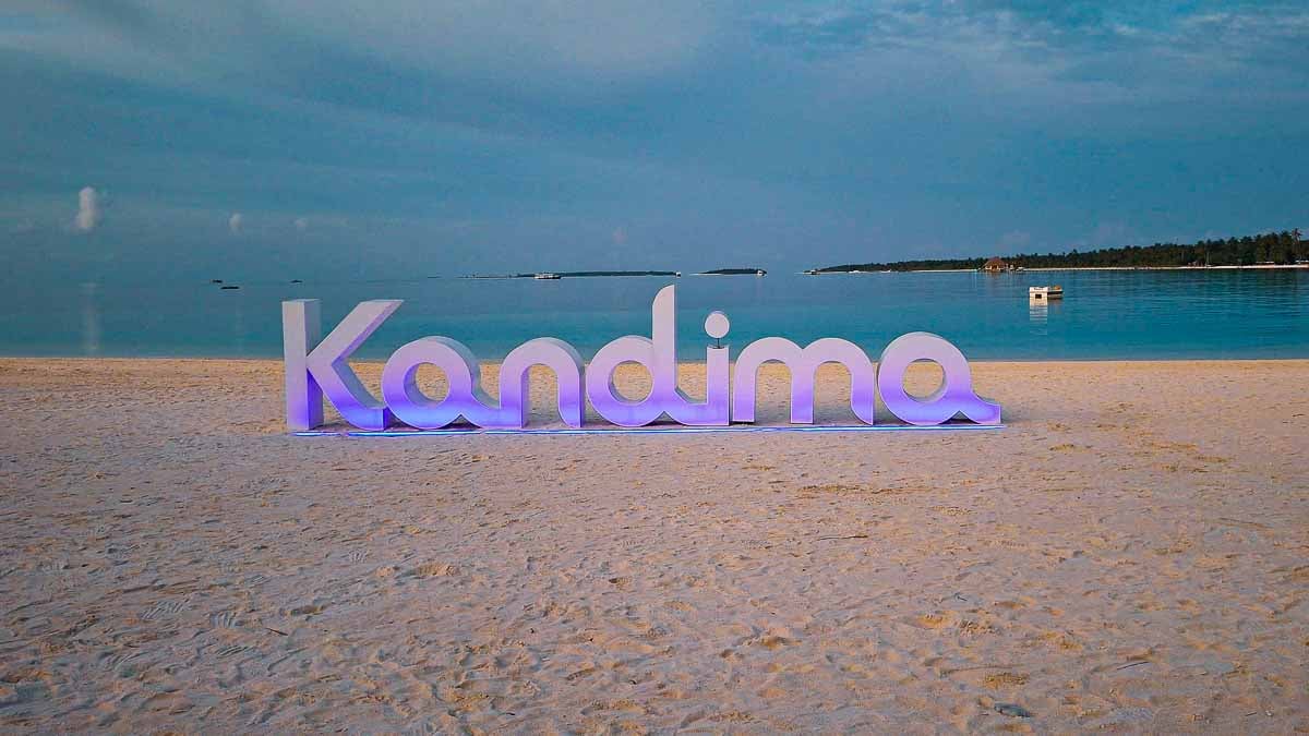 kandima sign on the beach at night time