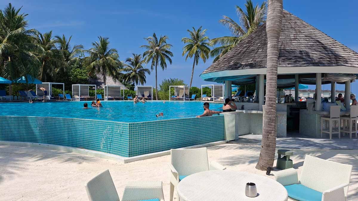 swimming pool on the beach with bar