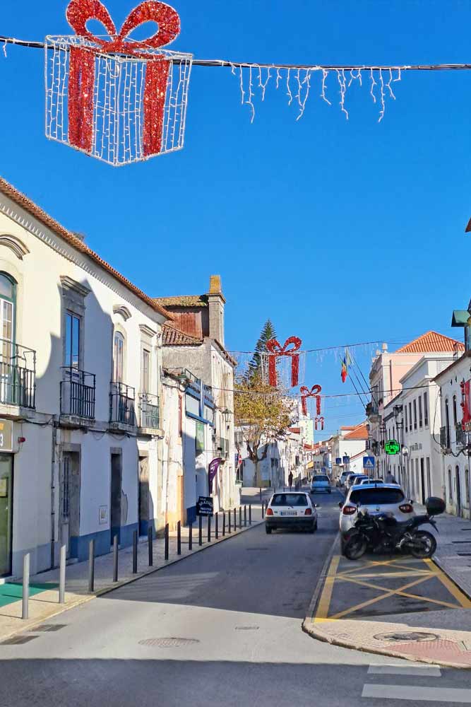 A typical Portuguese cobbled street with white two-store houses in Azambuja