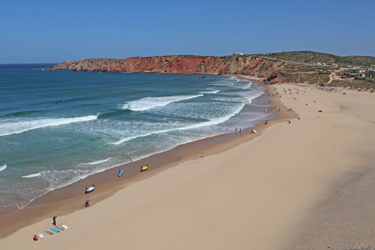 beautiful beach with some surfers