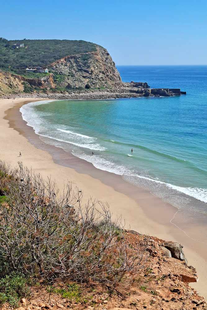 Cabanas Valhas Beach surrounded by the cliffs near Salema