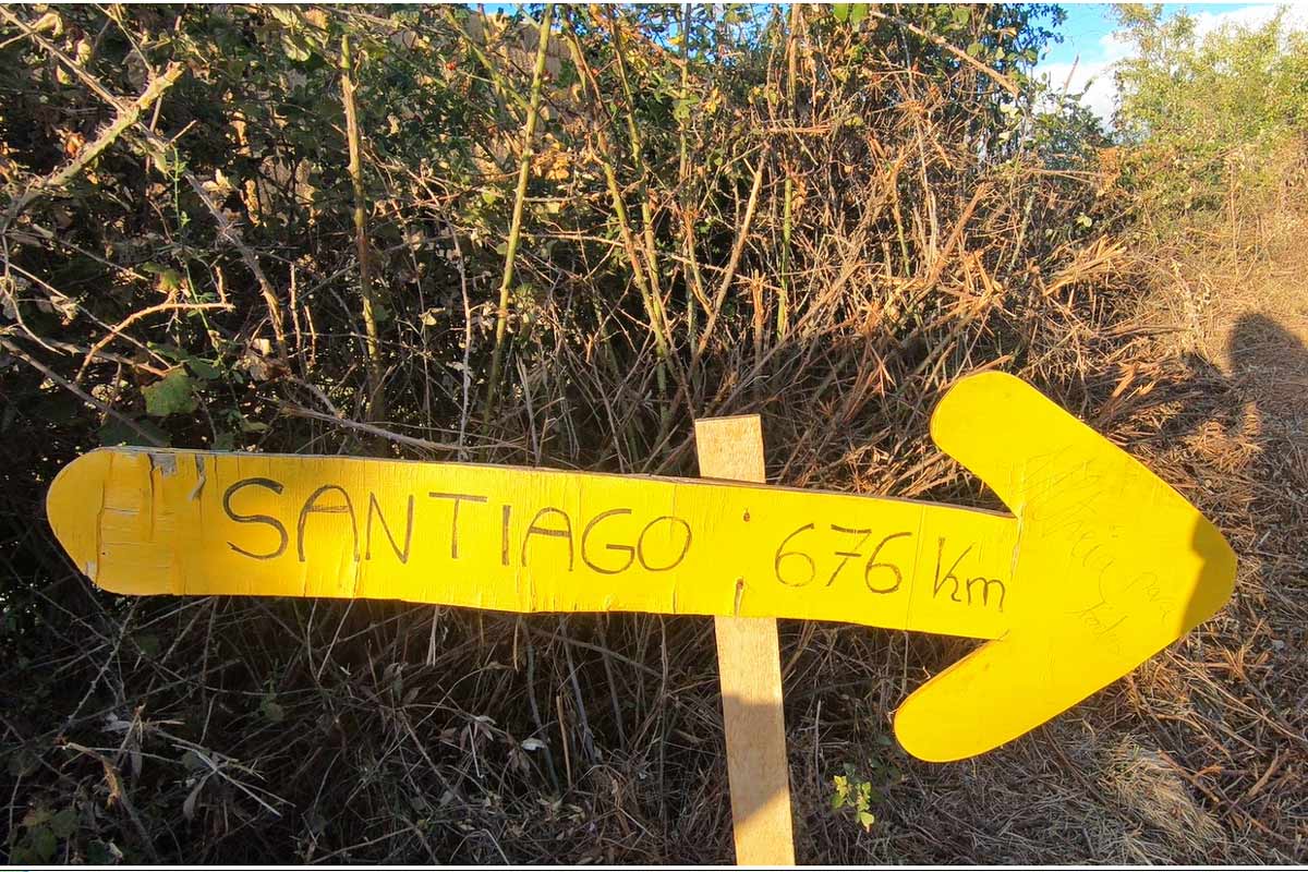 A traditional Camino yellow arrow on the Camino Frances
