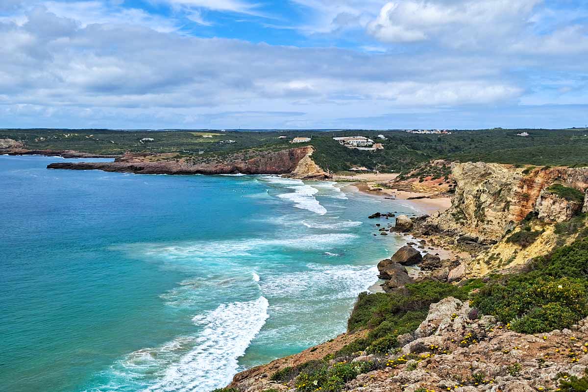 A view of the coast and Zavial Beach from the top of the cliffs
