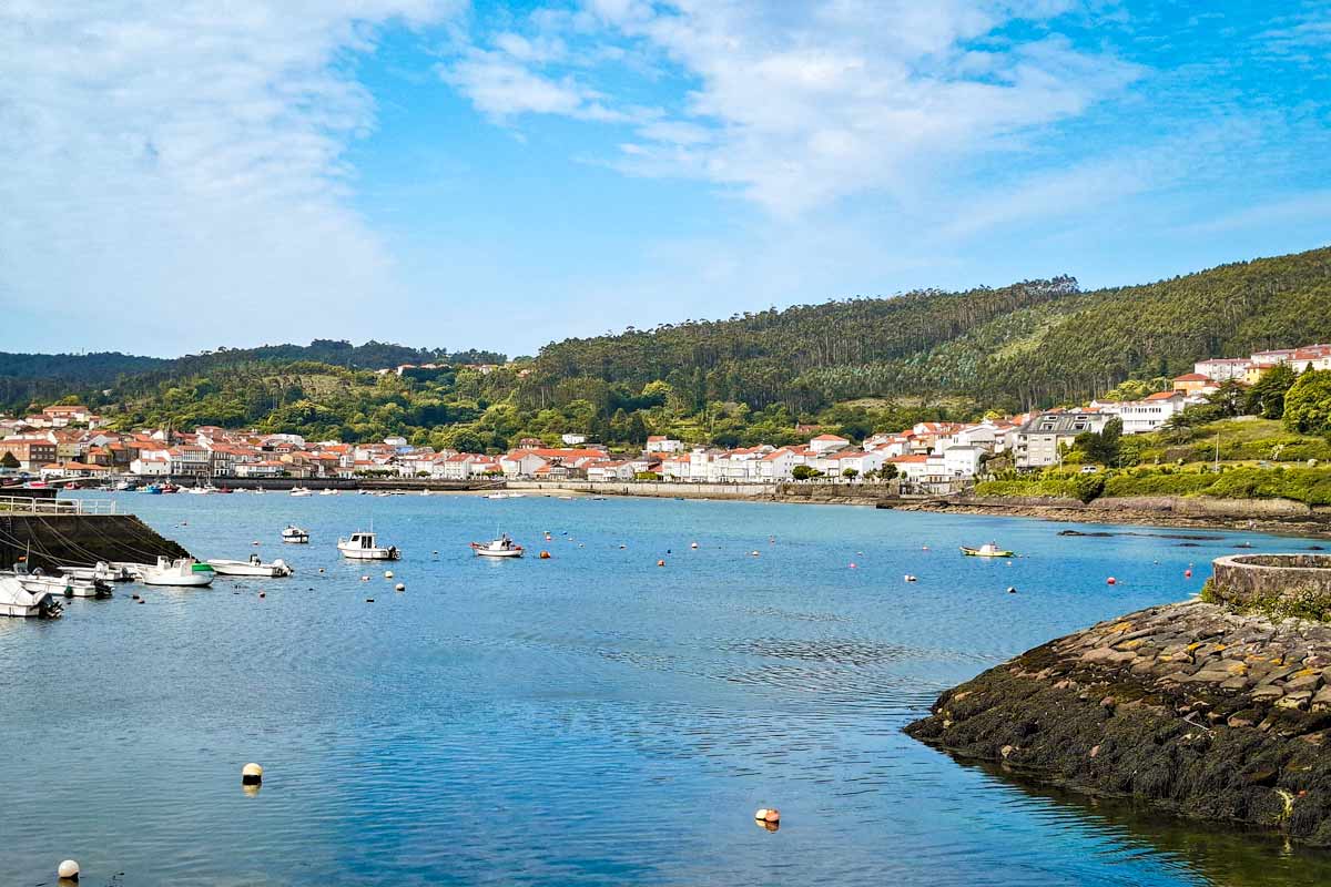 A seaside town stretched along the green coast of Galicia, Spain
