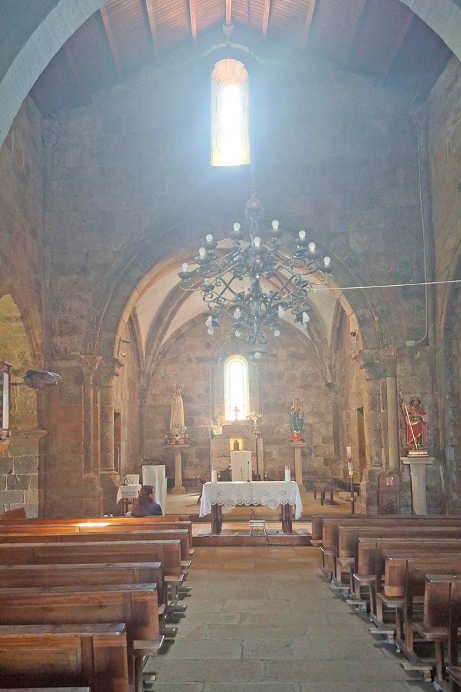 inside a church with sunlight coming through the window