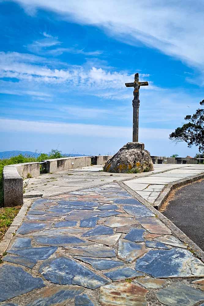 A traditional Galician stone cross on the Camino Finisterre in Spain