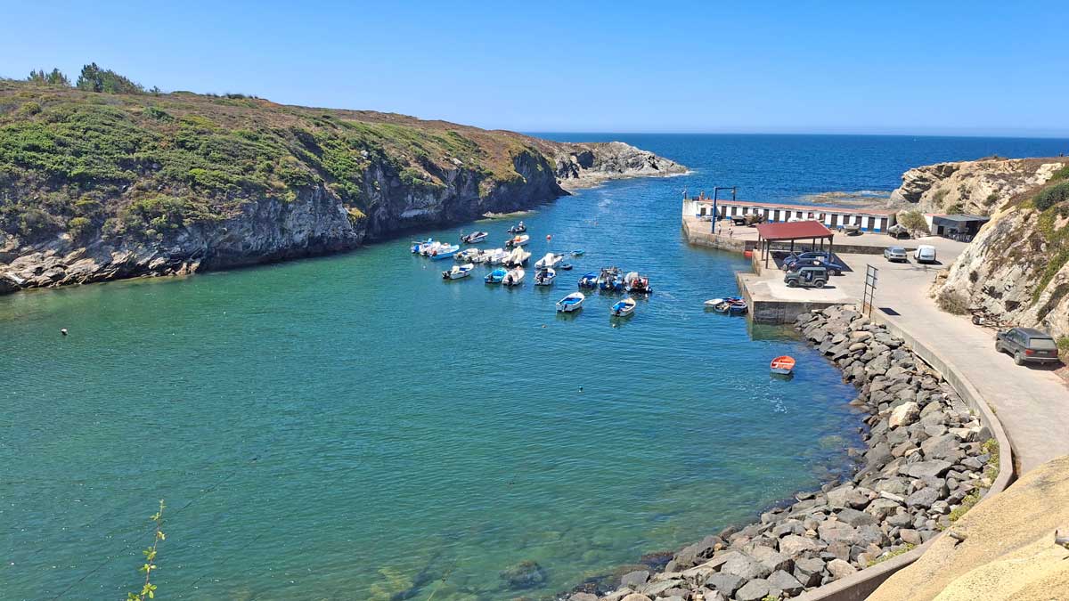 natural harbor with a couple of boats