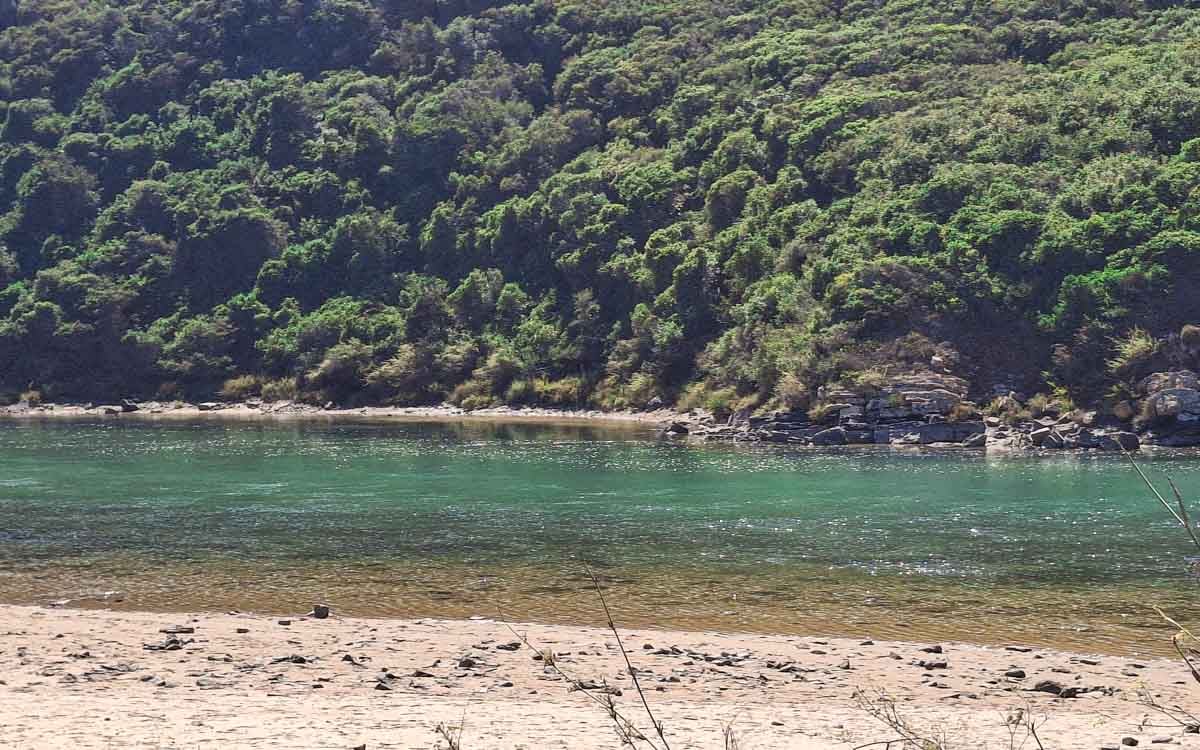 river beach with white sand